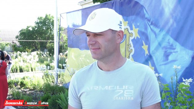 Володимир Шеремета, учасник легкоатлетичної естафети.